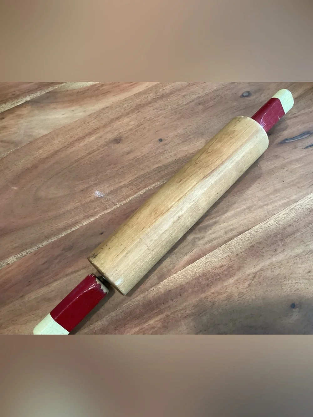 Vtg. American style wooden rolling pin with red and cream painted handles.